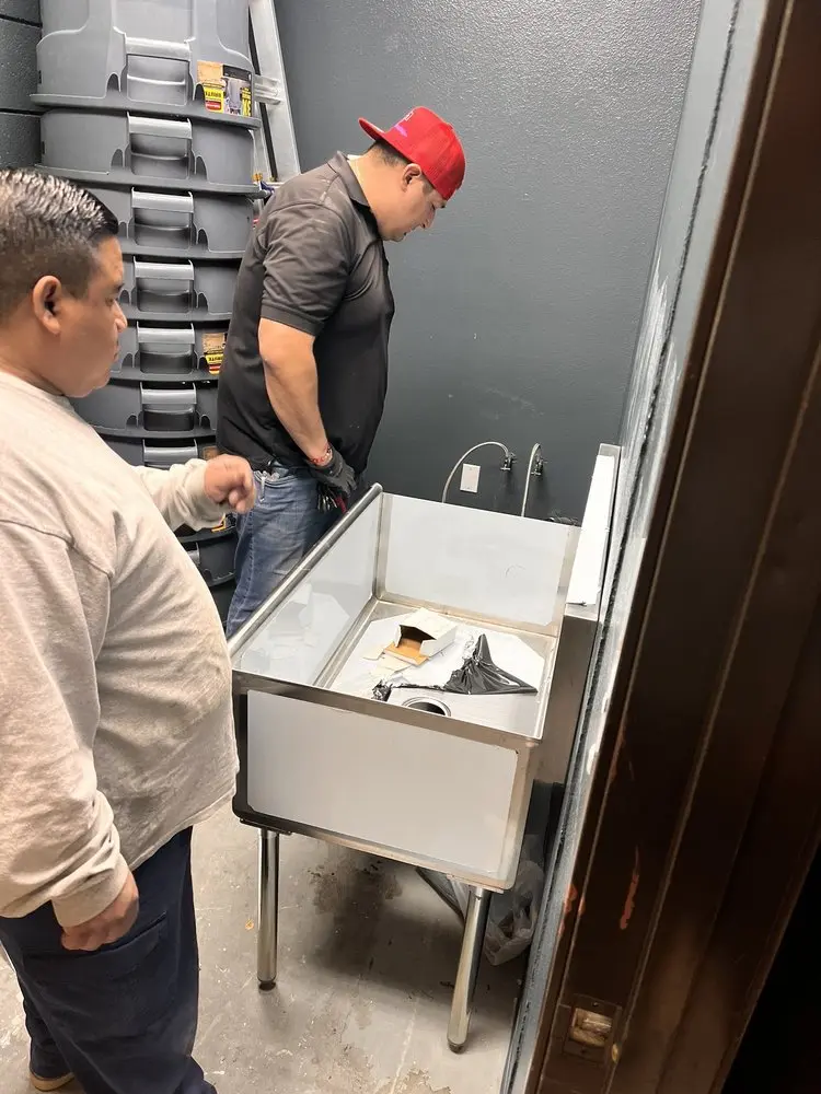 Commercial plumbing and sink installation in Dixon